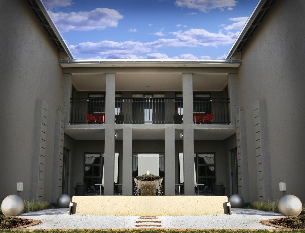 Altissimo Guesthouse Bloemfontein Oda fotoğraf